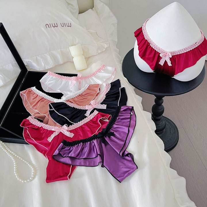 Low-rise ice silk panties with a scalloped hem.