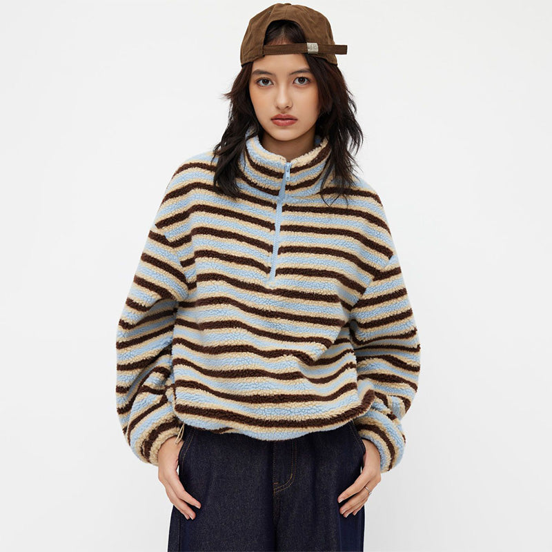 New loose-fitting, warm wool-blend top with a stand-up collar