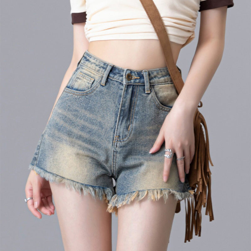 High-waisted raw-hem denim shorts—versatile fit