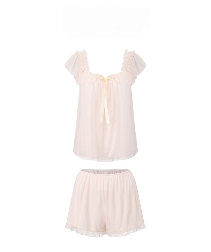 Two-piece set featuring a sexy, sheer mesh, low-cut solid-color top and shorts.