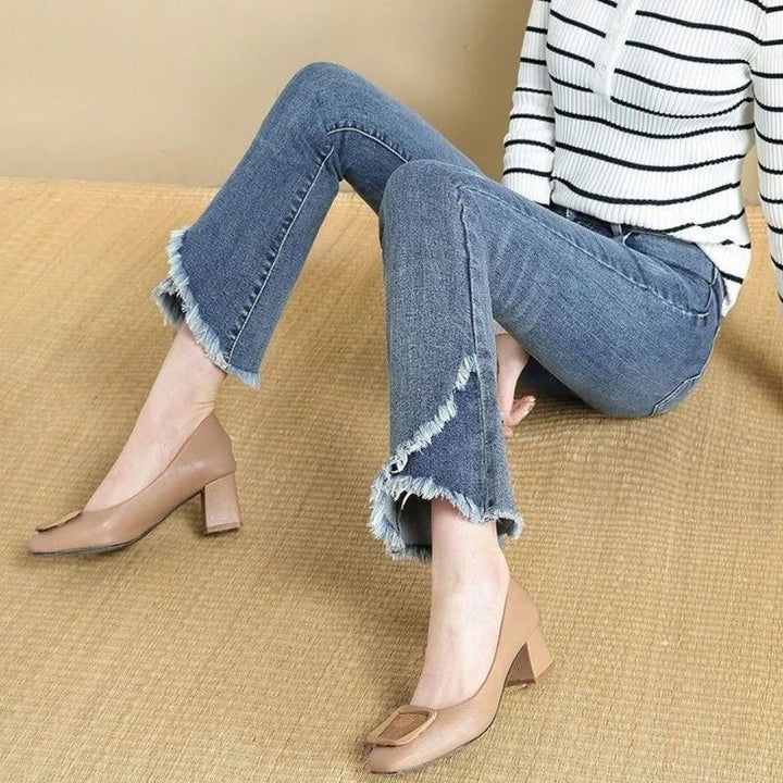 New high-waisted, slimming, stretchy, plus-size cropped kick-flare jeans.