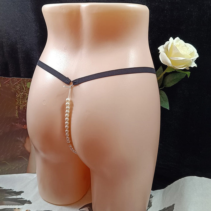 Highly elastic, openwork embroidered lace thong with massage benefits.