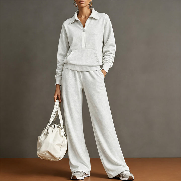 Style a half-zip sweatshirt with casual wide-leg trousers