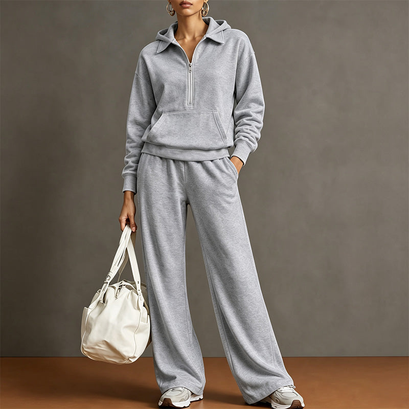 Style a half-zip sweatshirt with casual wide-leg trousers