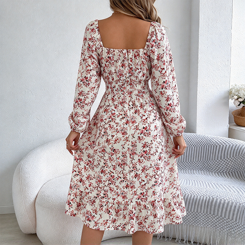 Elegant floral long-sleeve ruffled dress with a fitted waist.