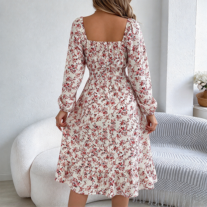 Elegant floral long-sleeve ruffled dress with a fitted waist.