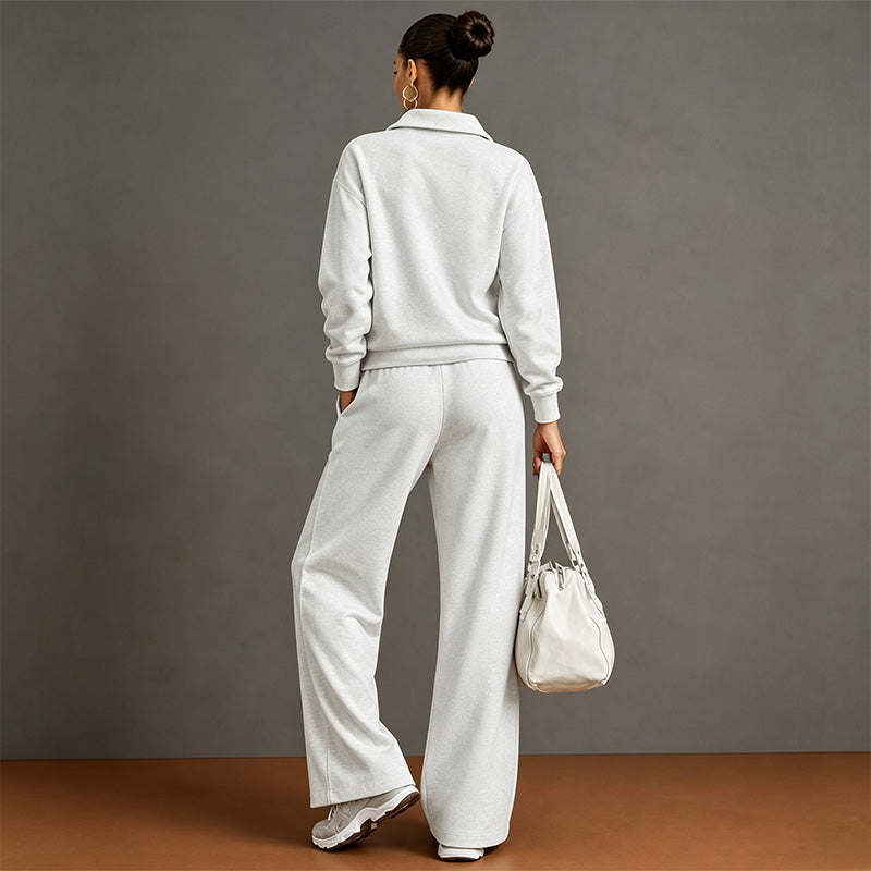 Style a half-zip sweatshirt with casual wide-leg trousers