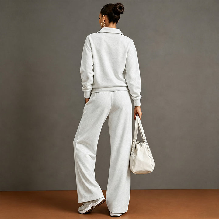 Style a half-zip sweatshirt with casual wide-leg trousers