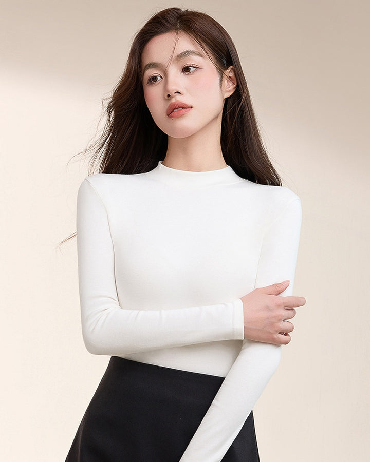 High-neck cotton top + leather skirt