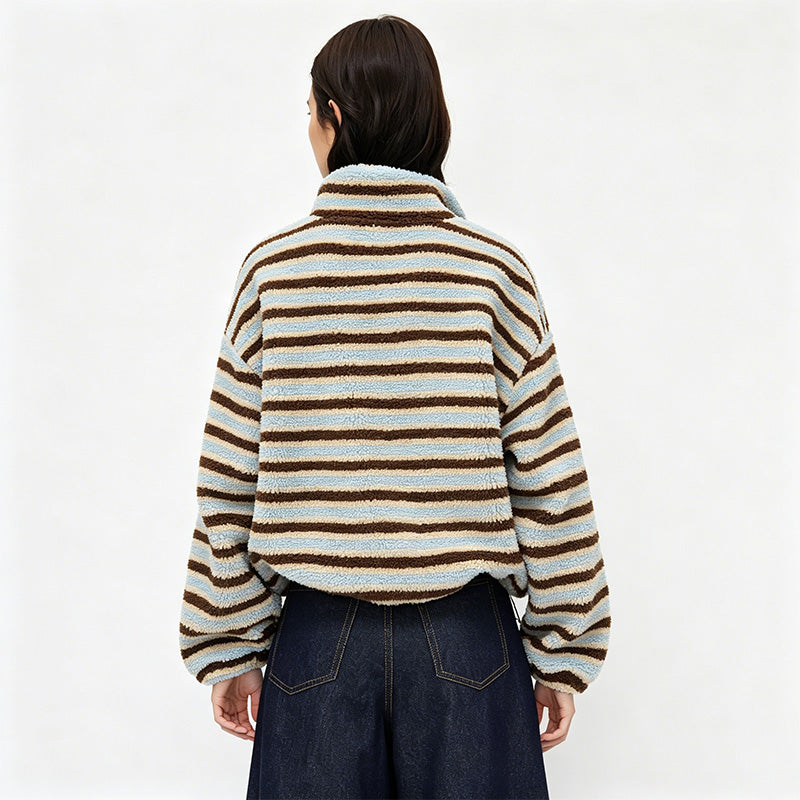 New loose-fitting, warm wool-blend top with a stand-up collar