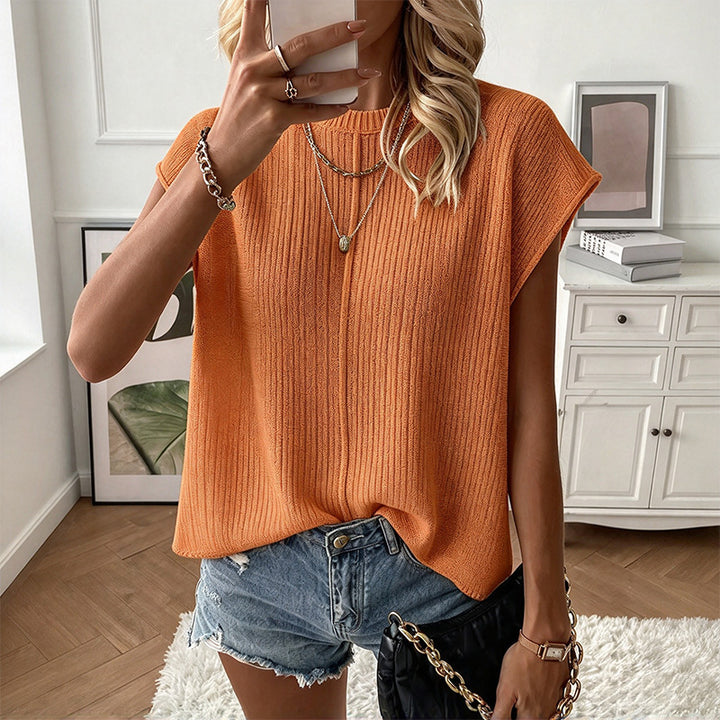 Casual, relaxed knit top—loose-fitting and versatile.