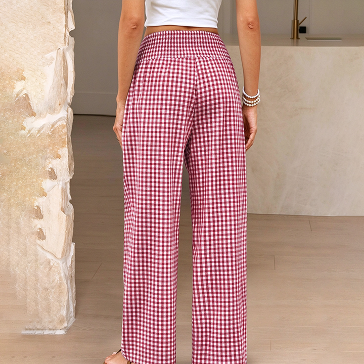 High-waisted, wide-leg plaid trousers—a stylish choice
