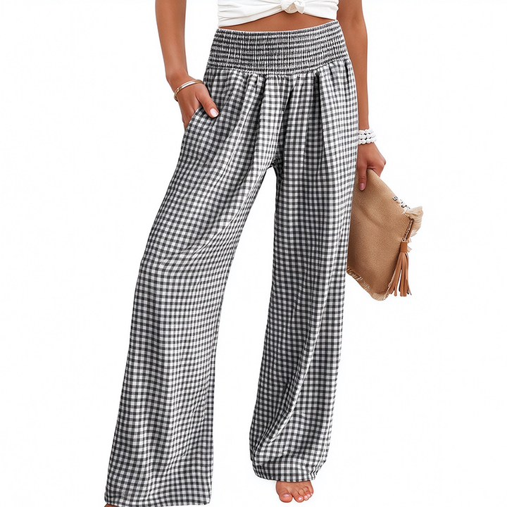 High-waisted, wide-leg plaid trousers—a stylish choice