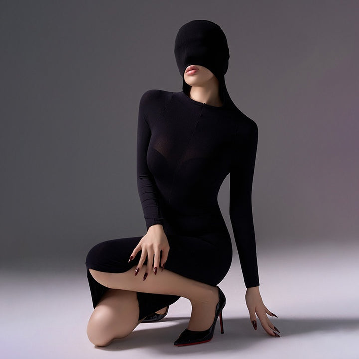Mysterious, form-fitting, bodycon dress.
