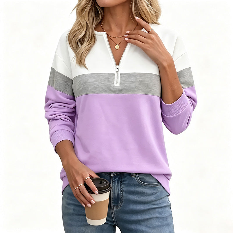 Half-zip long-sleeve sweatshirt—loose fit that flatters the figure