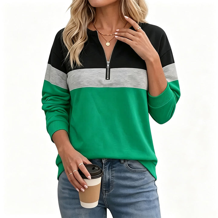 Half-zip long-sleeve sweatshirt—loose fit that flatters the figure