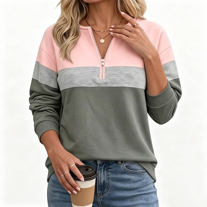 Half-zip long-sleeve sweatshirt—loose fit that flatters the figure