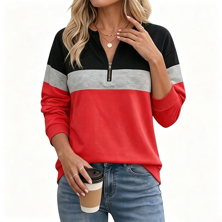 Half-zip long-sleeve sweatshirt—loose fit that flatters the figure