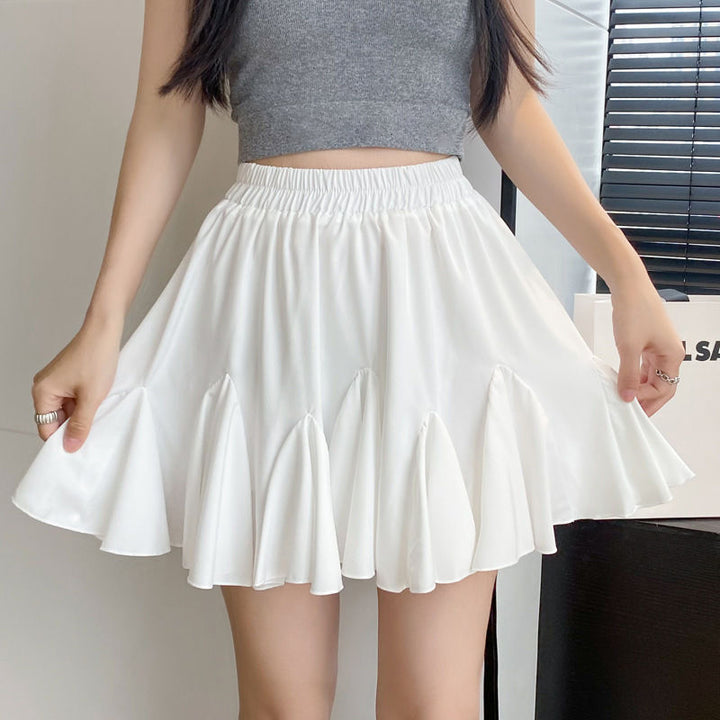 Versatile high-waisted pleated skirt featuring ruffles and a lining