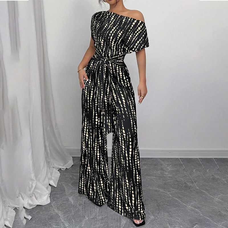 Women’s Asymmetric-Neck Off-Shoulder Cinched-Waist Jumpsuit