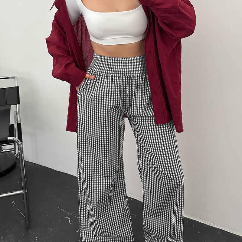 High-waisted, wide-leg plaid trousers—a stylish choice