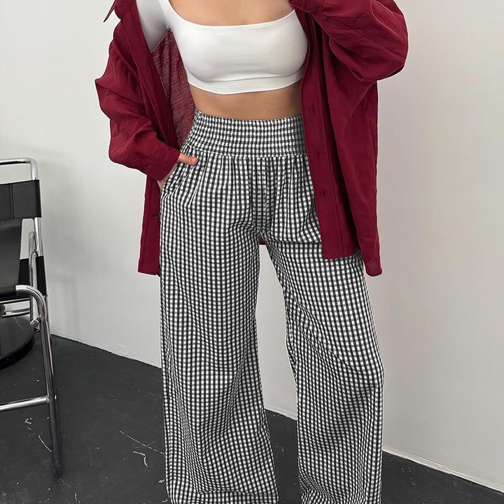 High-waisted, wide-leg plaid trousers—a stylish choice