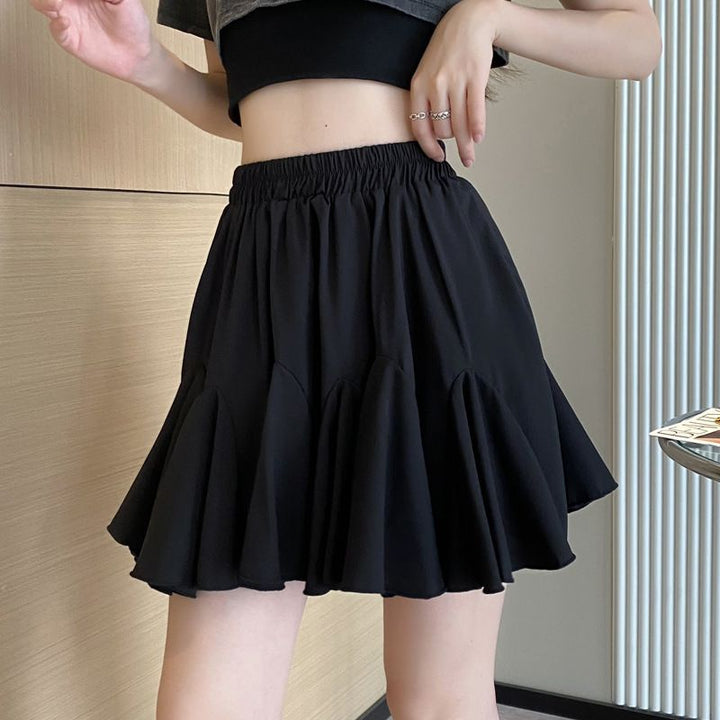 Versatile high-waisted pleated skirt featuring ruffles and a lining