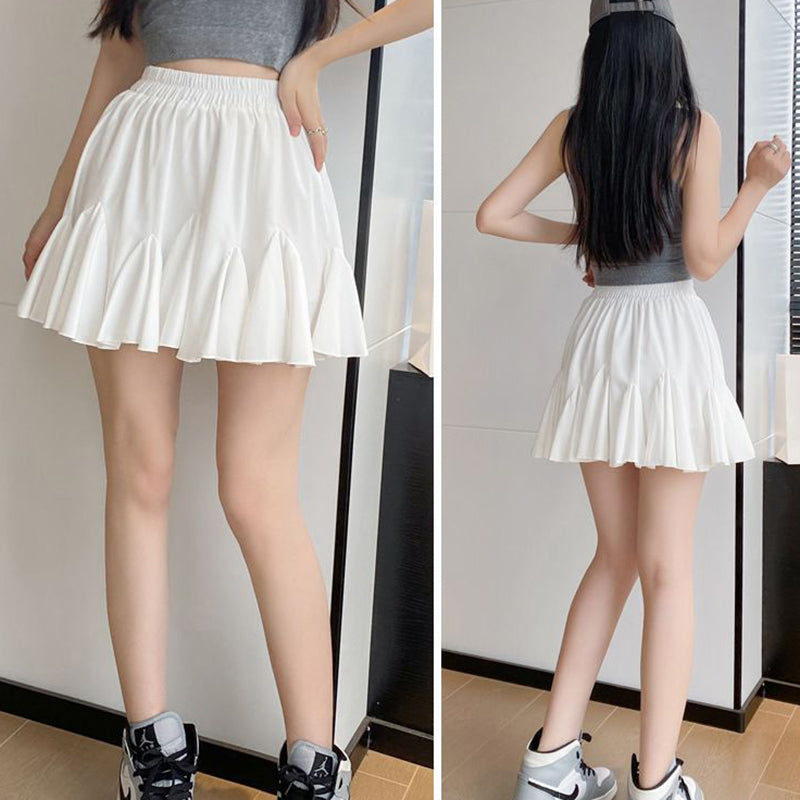 Versatile high-waisted pleated skirt featuring ruffles and a lining