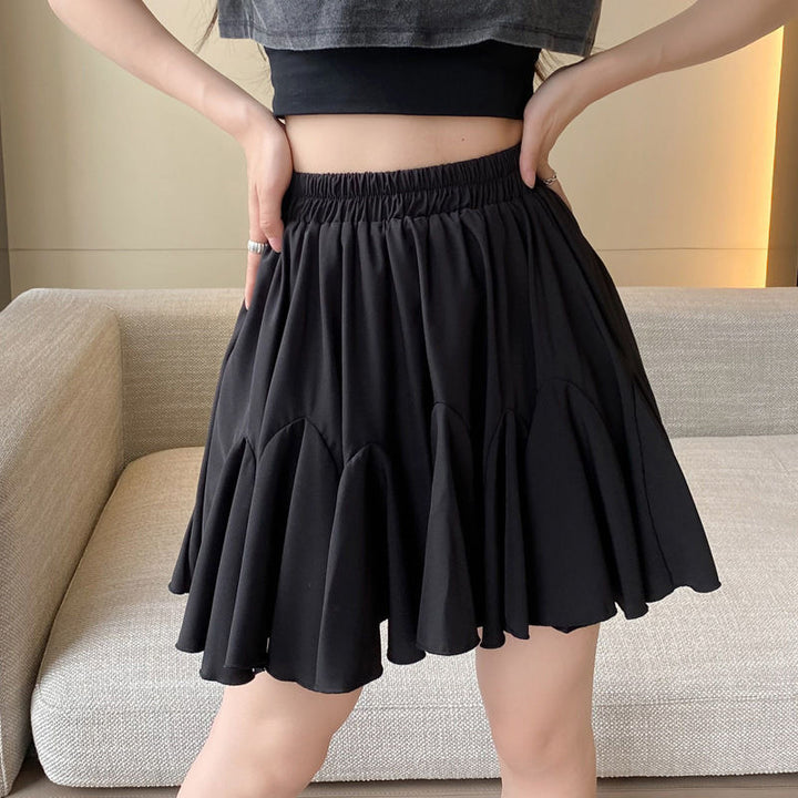 Versatile high-waisted pleated skirt featuring ruffles and a lining
