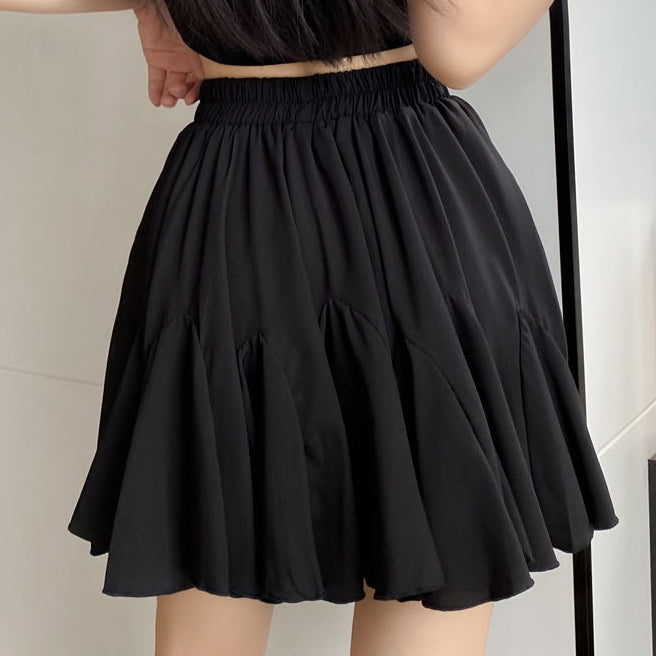 Versatile high-waisted pleated skirt featuring ruffles and a lining