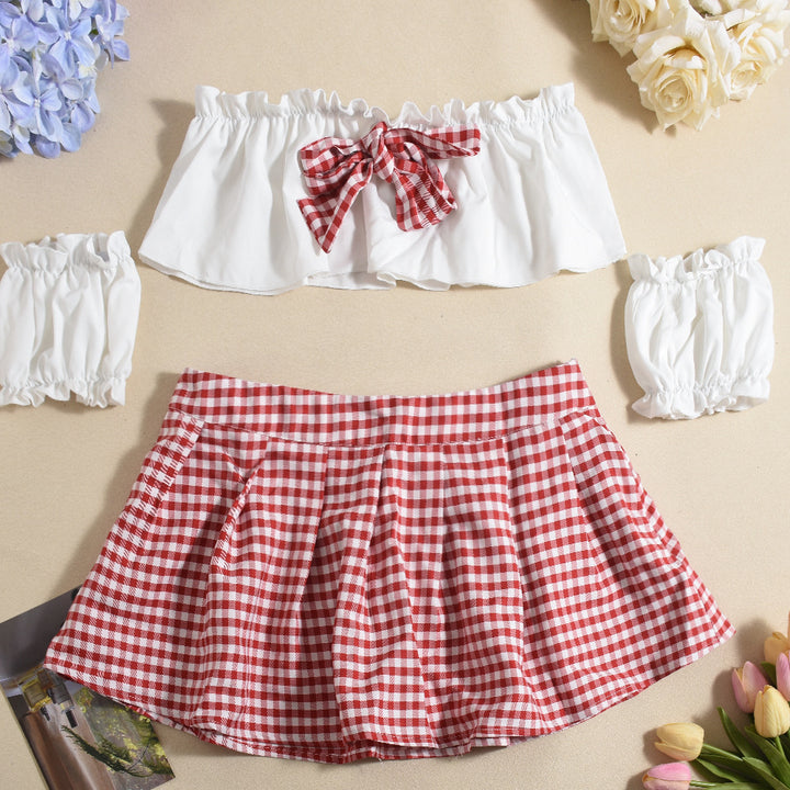 The viral plaid tube top and pleated mini skirt.