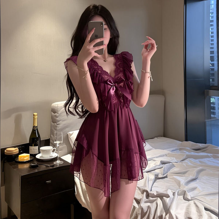 Satin and polka-dot mesh babydoll dress with sweet bow detail.