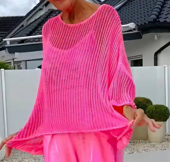 Two-piece set featuring a loose-fitting knit top and a jumpsuit.