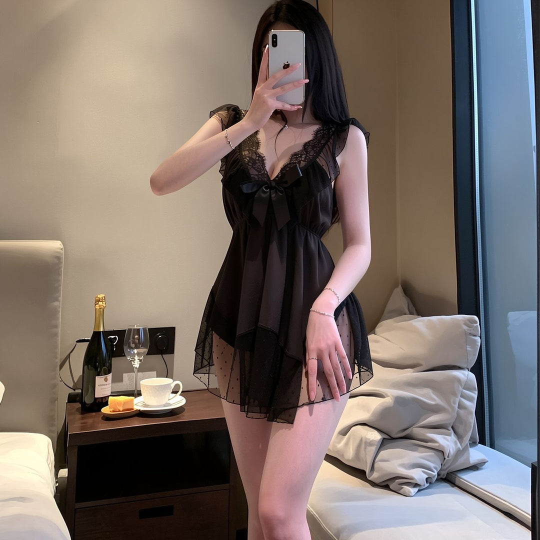 Satin and polka-dot mesh babydoll dress with sweet bow detail.