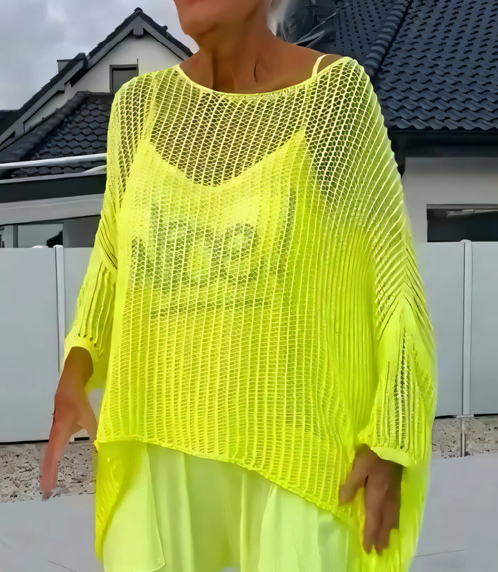 Two-piece set featuring a loose-fitting knit top and a jumpsuit.