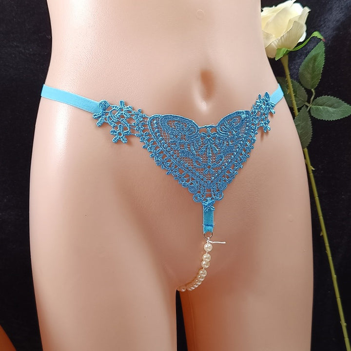 Highly elastic, openwork embroidered lace thong with massage benefits.
